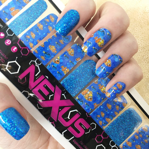 Finding Clownfish β¦ Nail Wrap β¦ 22 - tip Set - Espionage CosmeticsEspionage CosmeticsFinding Clownfish β¦ Nail Wrap β¦ 22 - tip Set